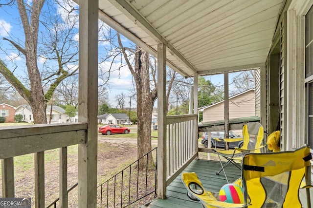 wooden deck featuring a porch