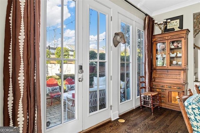 122 Brighton Blvd, Woodstock, GA 30188 - entryway featuring dark wood-style flooring and ornamental molding