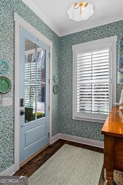 122 Brighton Blvd, Woodstock, GA 30188 - interior space with dark wood-style flooring, a wealth of natural light, and wallpapered walls