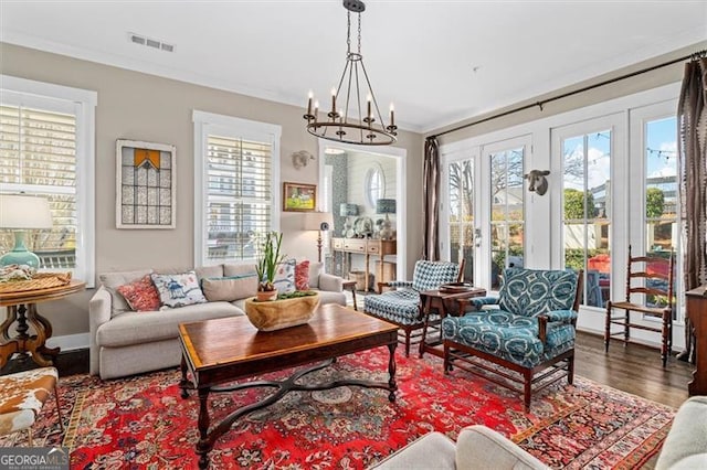 122 Brighton Blvd, Woodstock, GA 30188 - interior space featuring french doors, a notable chandelier, visible vents, and plenty of natural light
