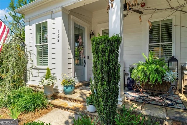 122 Brighton Blvd, Woodstock, GA 30188 - view of exterior entry with a porch