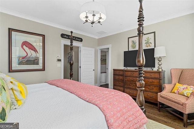 122 Brighton Blvd, Woodstock, GA 30188 - bedroom with wood finished floors, a notable chandelier, and ornamental molding