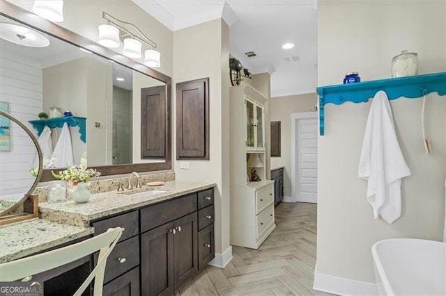 122 Brighton Blvd, Woodstock, GA 30188 - bathroom featuring a soaking tub, vanity, visible vents, recessed lighting, and baseboards
