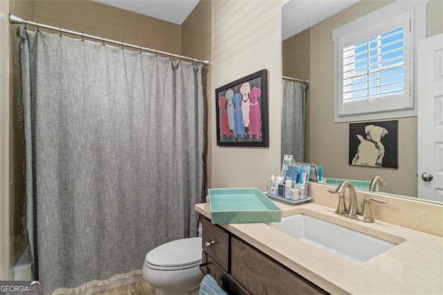 122 Brighton Blvd, Woodstock, GA 30188 - full bathroom featuring toilet and vanity