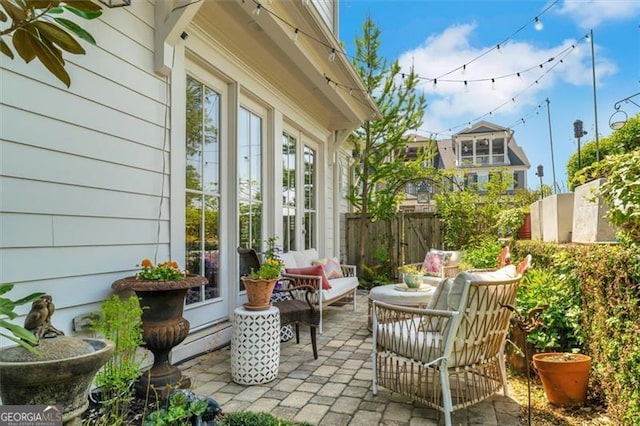 122 Brighton Blvd, Woodstock, GA 30188 - view of patio with french doors, fence, and an outdoor living space
