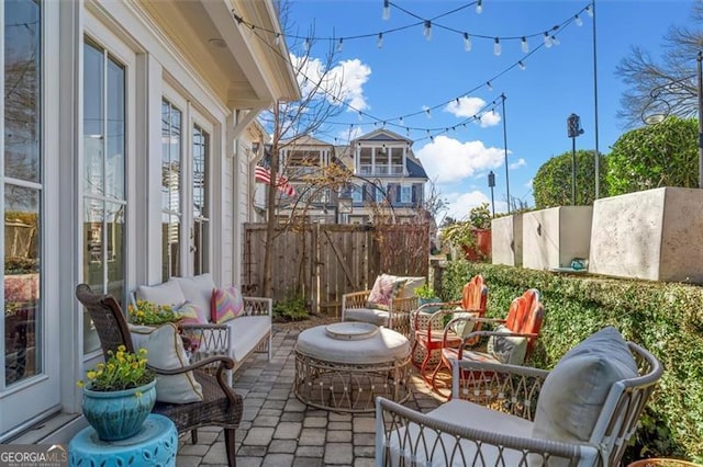 122 Brighton Blvd, Woodstock, GA 30188 - view of patio with an outdoor living space and fence