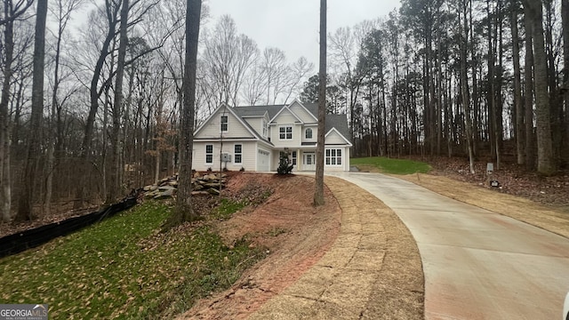 view of front facade featuring driveway and a garage