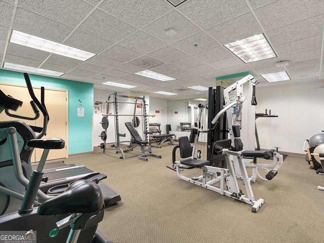 exercise room with a drop ceiling