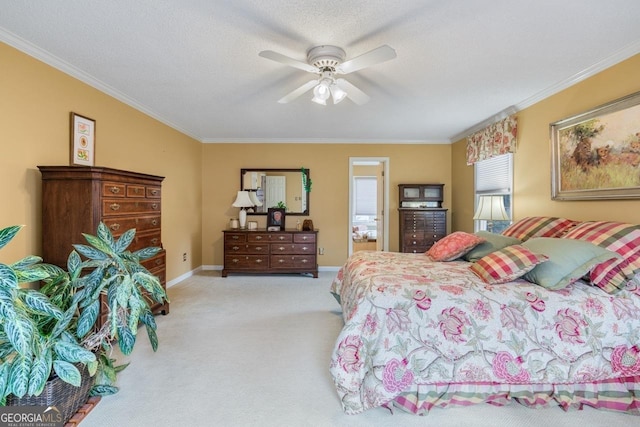 bedroom featuring ceiling fan, crown molding, light carpet, and a textured ceiling