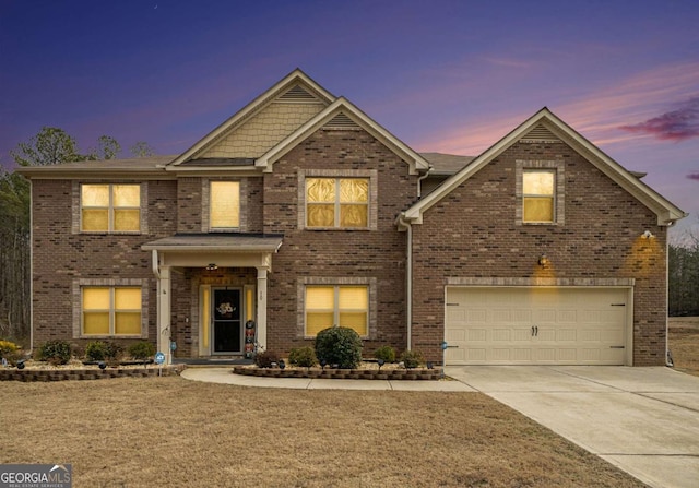 view of front of property featuring a garage