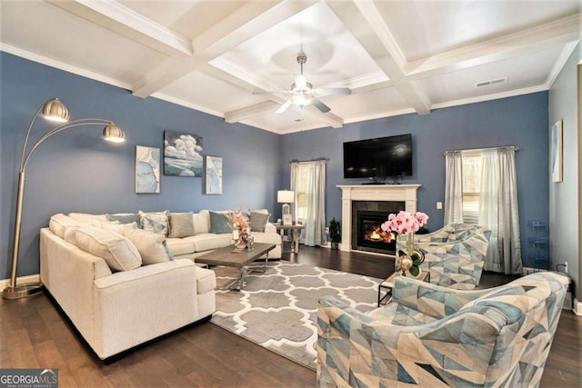 living room with coffered ceiling, dark hardwood / wood-style floors, and beamed ceiling