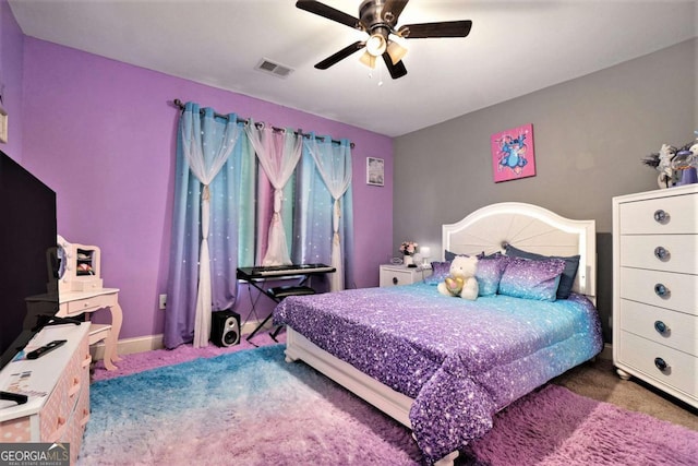 carpeted bedroom with ceiling fan