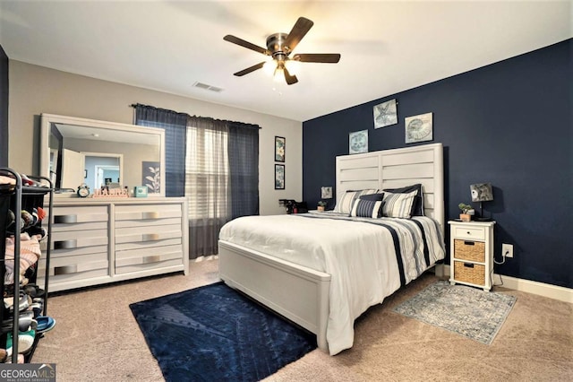 carpeted bedroom with ceiling fan