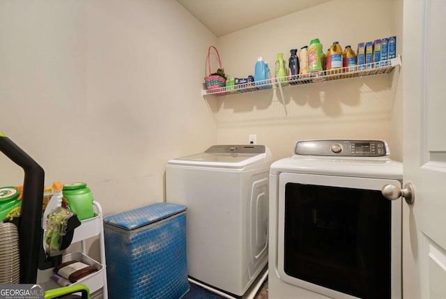 laundry room featuring washer and clothes dryer