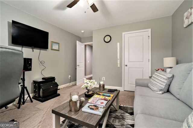 living room featuring carpet flooring and ceiling fan