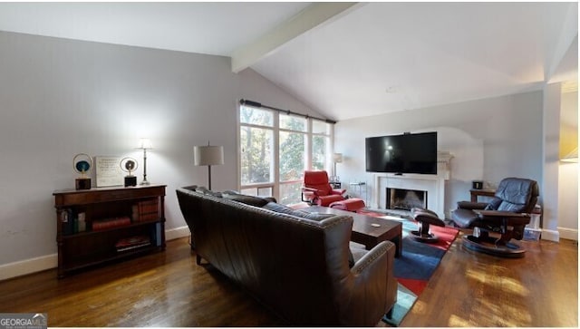 living room with dark hardwood / wood-style floors and lofted ceiling with beams