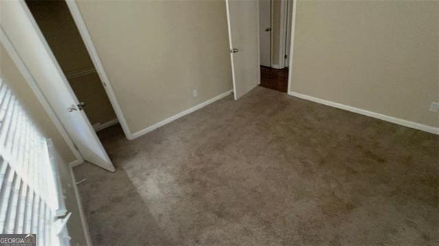 unfurnished bedroom featuring carpet flooring