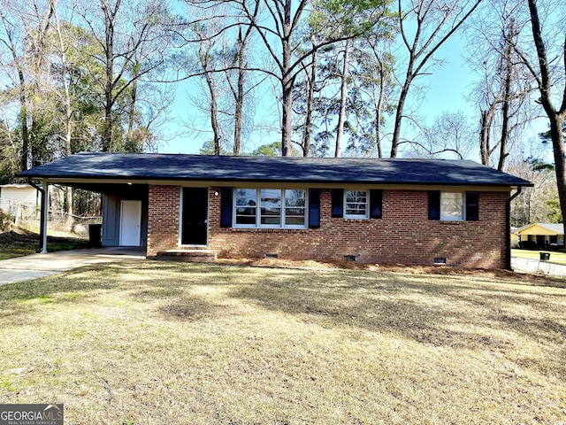 ranch-style house featuring a carport and a front lawn