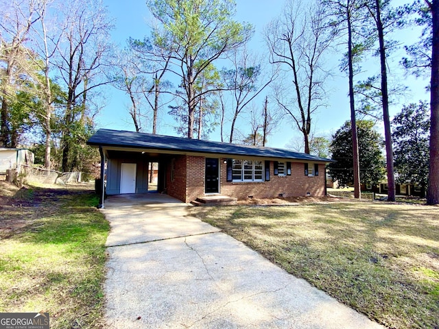 single story home with a carport and a front lawn