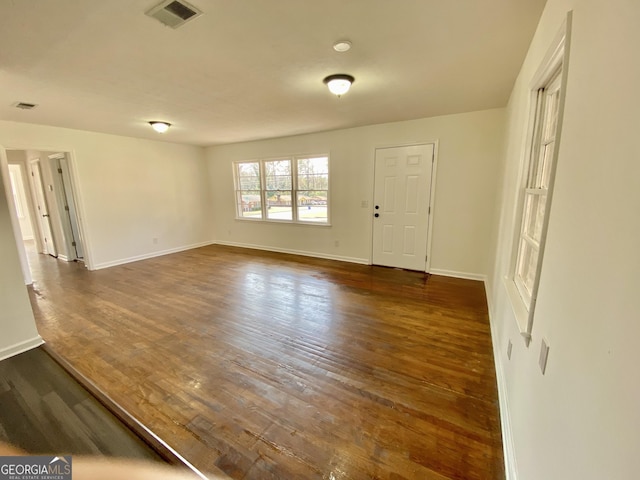 interior space featuring dark hardwood / wood-style flooring