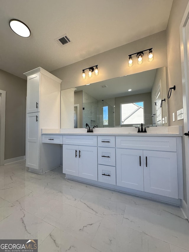 bathroom with marble finish floor, visible vents, toilet, and baseboards