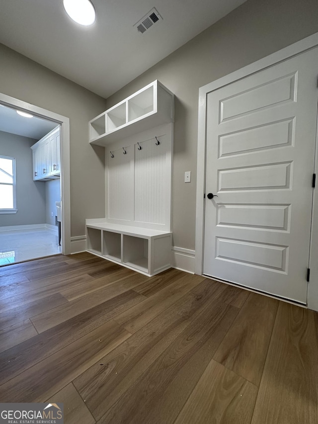 full bath featuring a shower stall, tile walls, and a freestanding bath