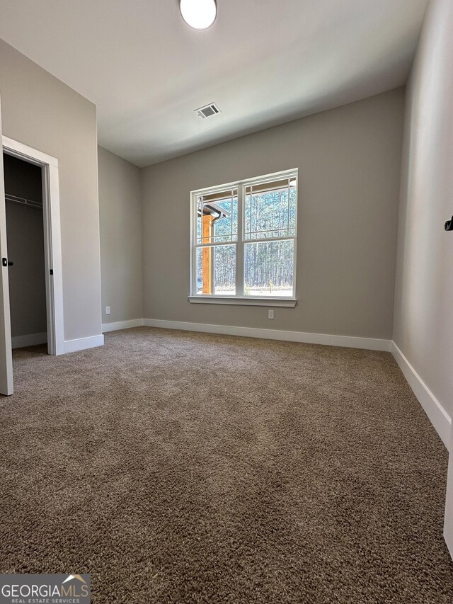 interior details featuring a fireplace, baseboards, and wood finished floors