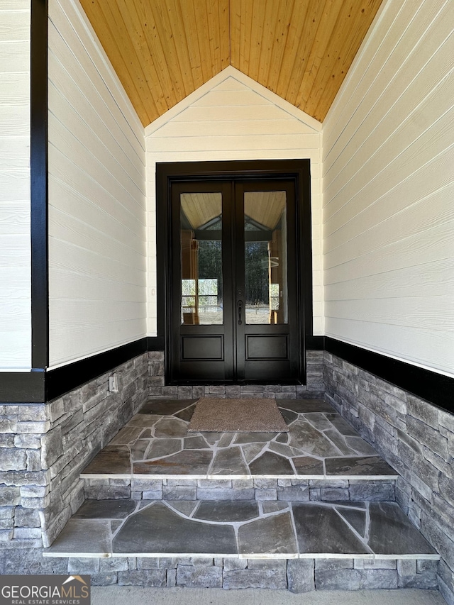 entrance to property featuring french doors