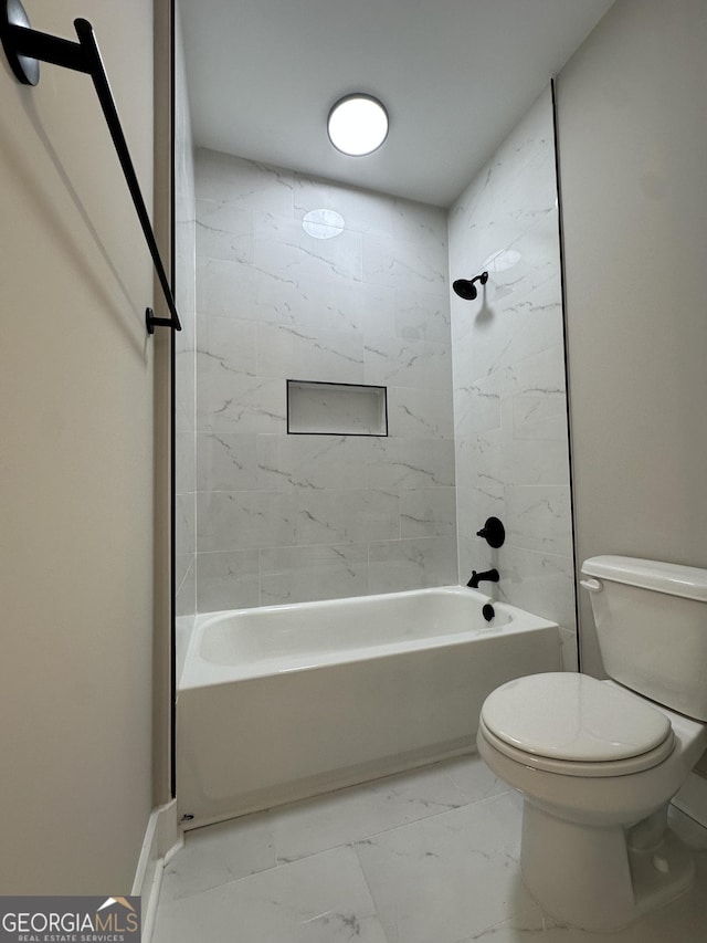 bathroom featuring a sink, marble finish floor, two vanities, and visible vents