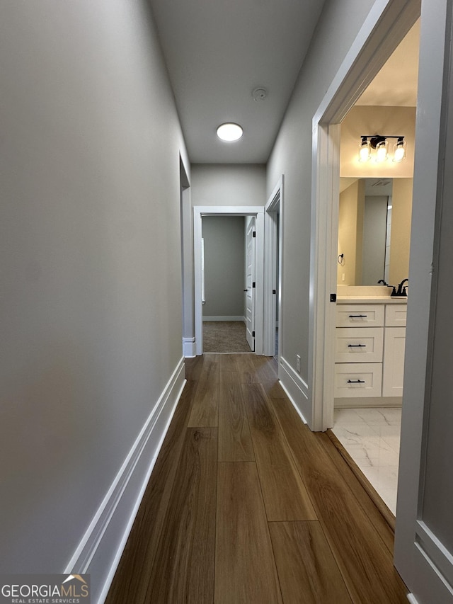 bathroom with visible vents, marble finish floor, and vanity