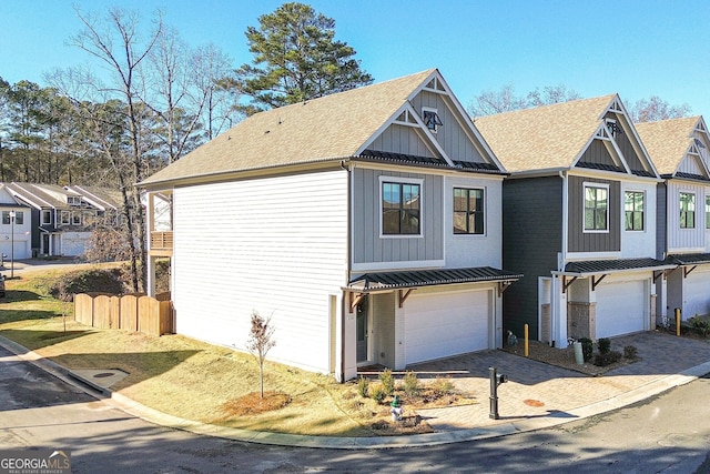 view of front of property featuring a garage