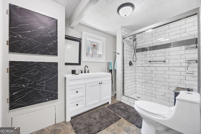 bathroom with a textured ceiling, stone tile flooring, a shower stall, and toilet