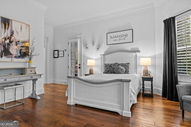 bedroom featuring ornamental molding, dark hardwood / wood-style floors, and access to outside