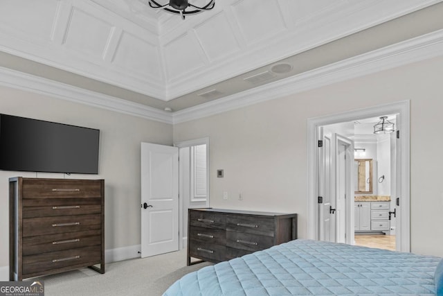 carpeted bedroom with ornamental molding and ensuite bathroom