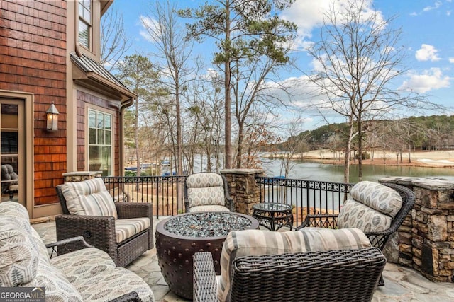 view of patio / terrace with a water view