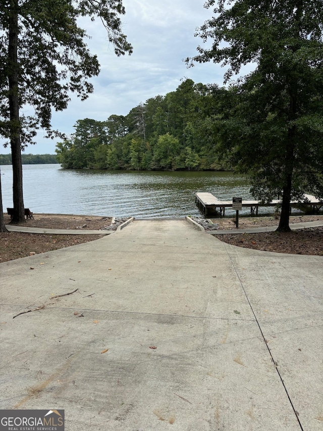 view of dock with a water view