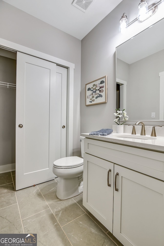 578 Brashy St, Woodstock, GA 30188 - bathroom with vanity and toilet