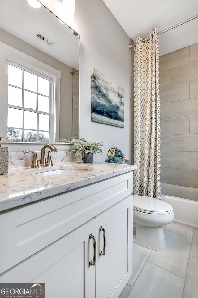 578 Brashy St, Woodstock, GA 30188 - full bathroom featuring vanity, toilet, and shower / bath combo with shower curtain