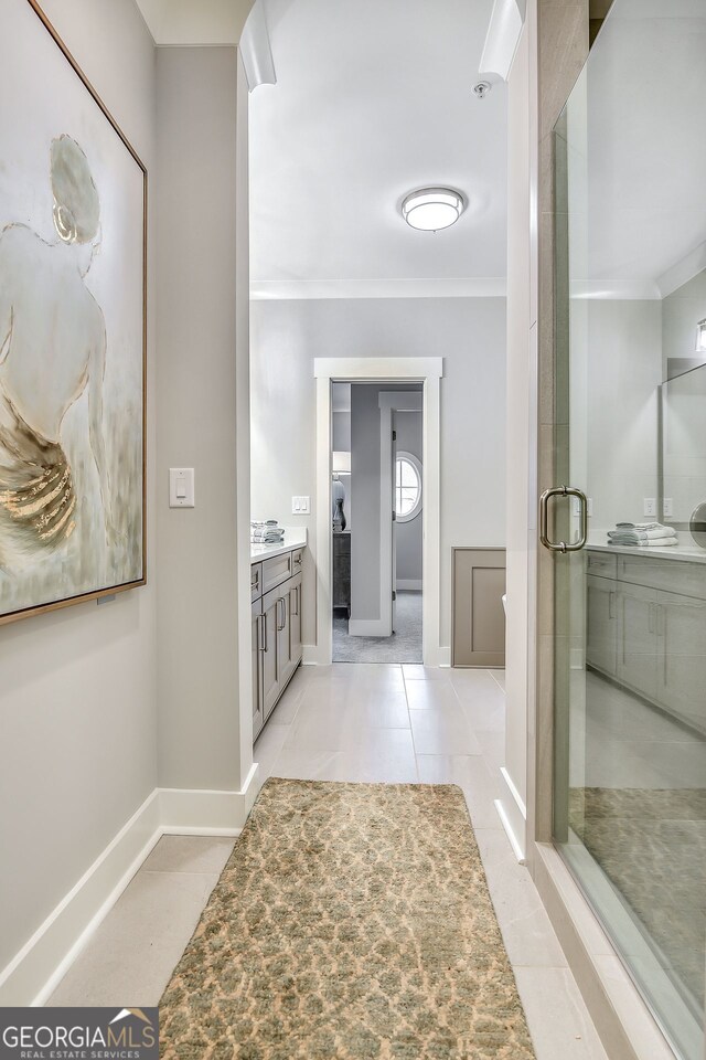 578 Brashy St, Woodstock, GA 30188 - hall with light tile patterned floors and ornamental molding