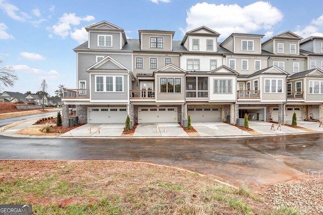 578 Brashy St, Woodstock, GA 30188 - townhome / multi-family property with central AC