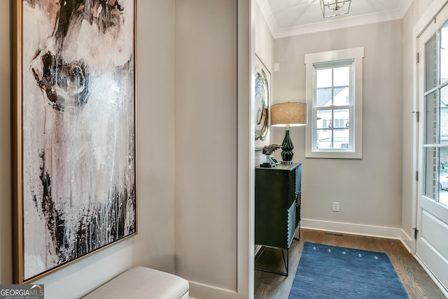578 Brashy St, Woodstock, GA 30188 - doorway with ornamental molding and dark hardwood / wood-style floors