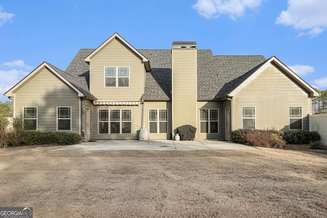 back of house featuring a patio area