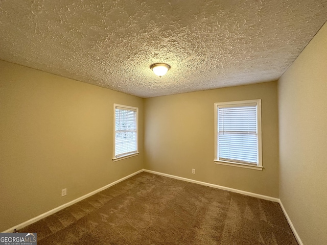 2922 Dale Pl, Decatur, GA 30032 - carpeted empty room with a textured ceiling