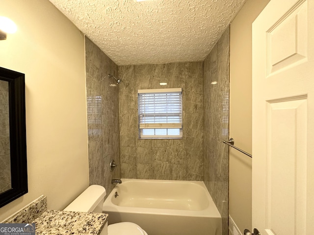 2922 Dale Pl, Decatur, GA 30032 - full bathroom featuring vanity, tiled shower / bath, a textured ceiling, and toilet