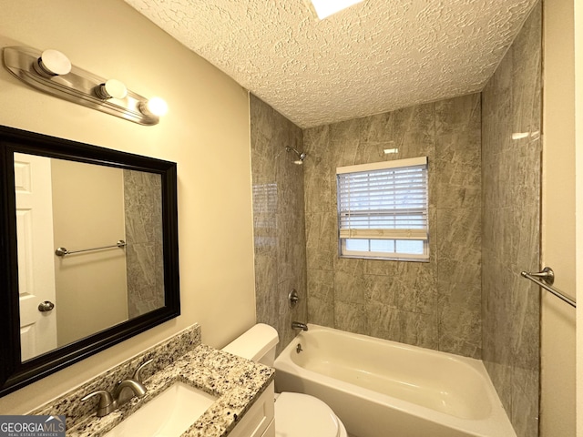 2922 Dale Pl, Decatur, GA 30032 - full bathroom featuring vanity, toilet, tiled shower / bath combo, and a textured ceiling