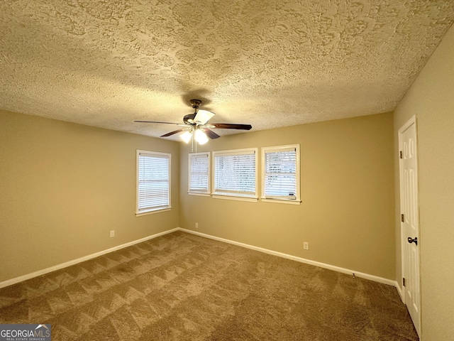 2922 Dale Pl, Decatur, GA 30032 - empty room with ceiling fan, carpet flooring, and a textured ceiling