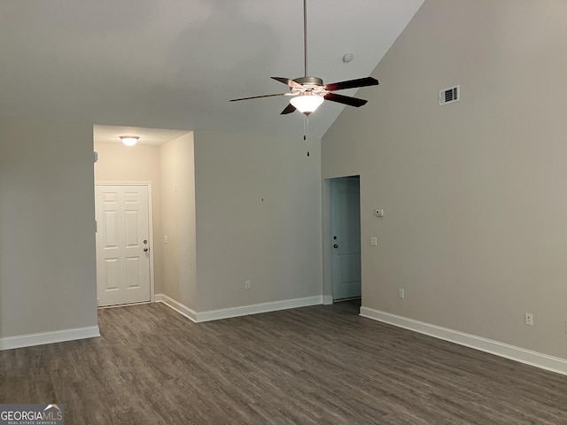 unfurnished living room with high vaulted ceiling, dark wood-type flooring, and ceiling fan