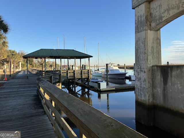 dock area with a water view