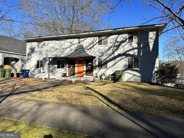 view of front of property with a front lawn