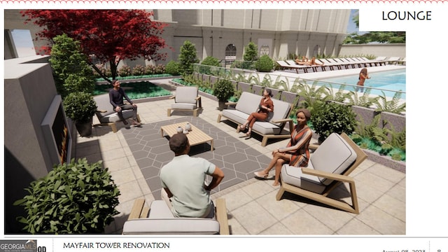 view of patio with a community pool and an outdoor living space